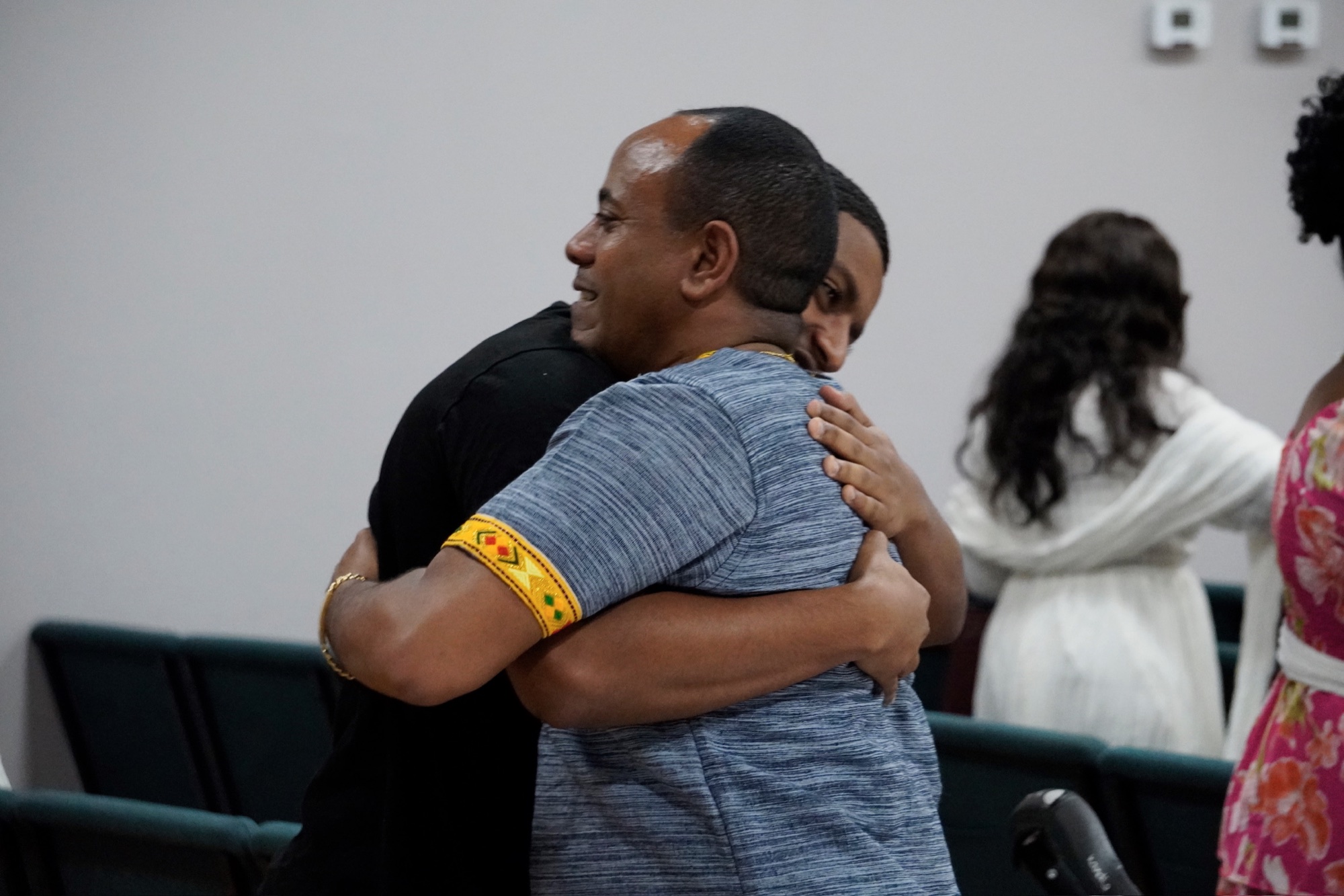Warm fellowship hug at church