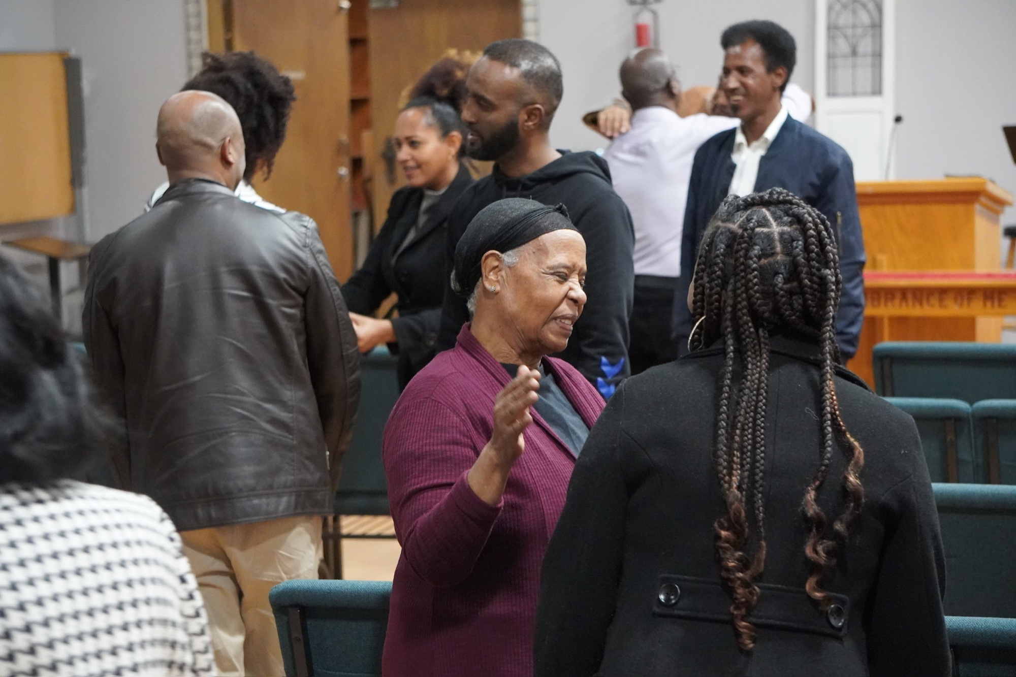 Church family fellowshipping after service