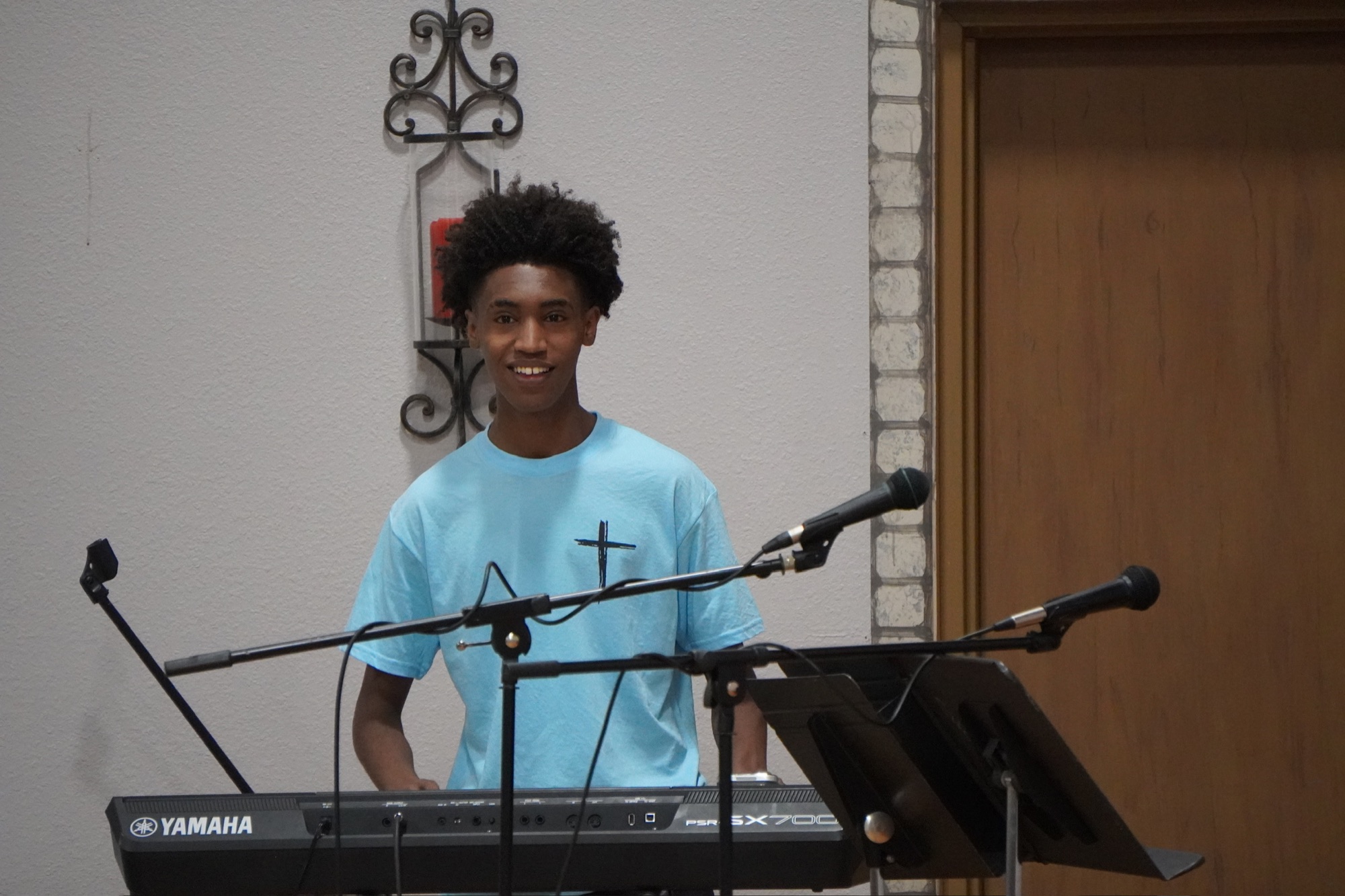 Youth musician serving in worship